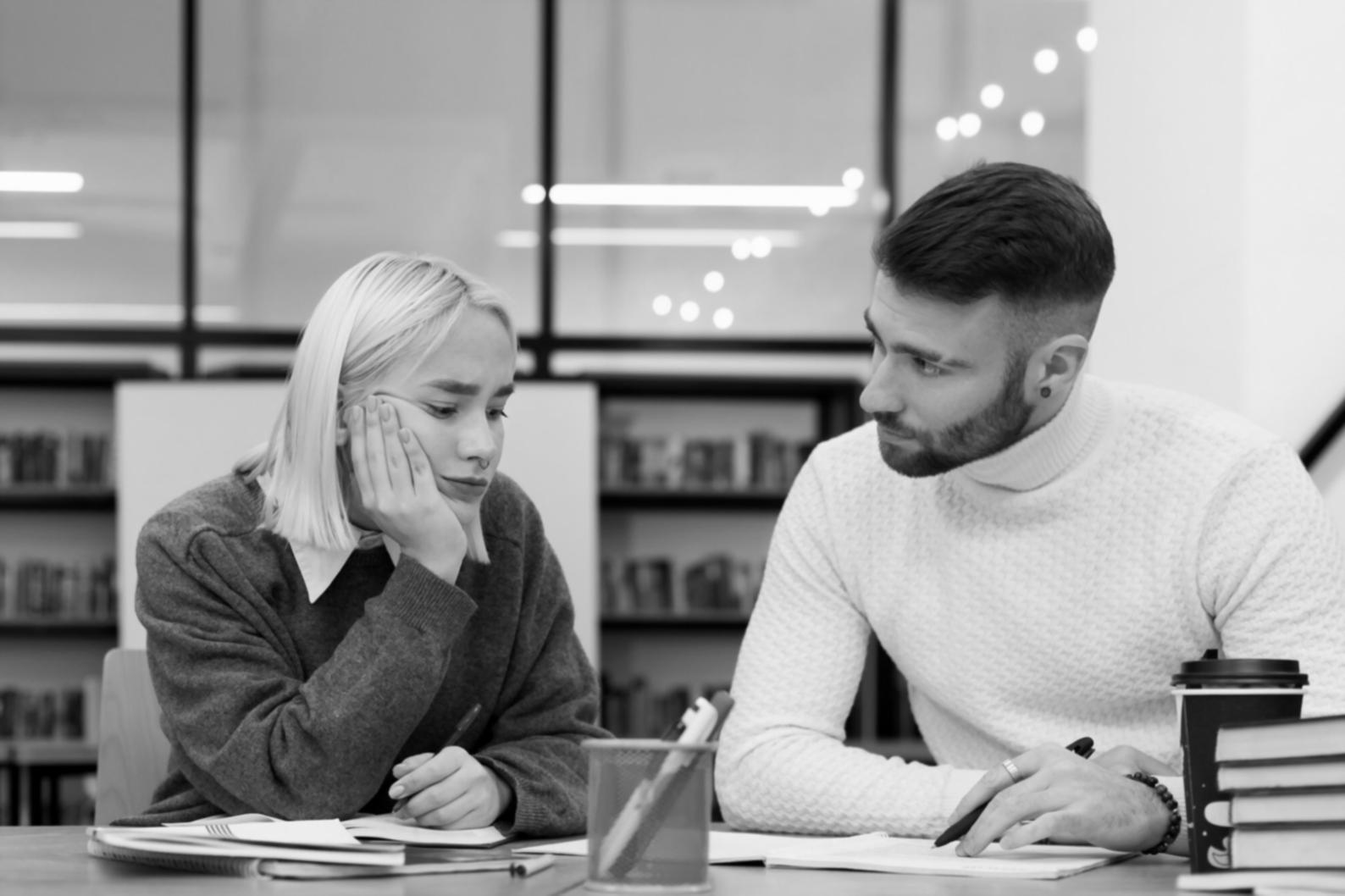 Financial analyst reviewing statistical reports and budget analysis charts